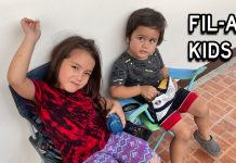 Fil-Am Brother and Sister Sharing a Bag of Potato Chips Fil-Am Children in the Philippines