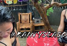 Filipinas Working in the Monsoon Rain Due to Design Flaw in Their Tarp Construction Project Filipinas work in the rain Barrio Barretto Subic Bay Philippines Rainy Season