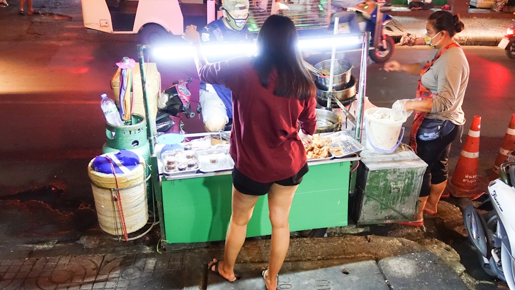 Watching People at a Fried Chicken Motorcycle Cart - Bangkok, Thailand