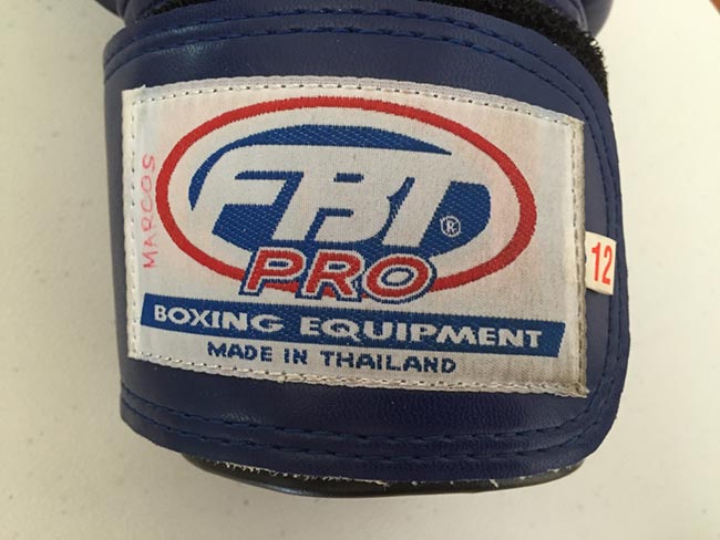 One-Hour Muay Thai Workout Plan for Expats in Thailand - Gloves FBT Pro Boxing Equipment