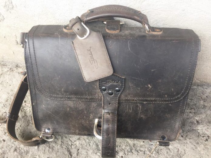 Saddleback Leather Thin Briefcase Travel Photos - Beautiful Scratches on the Front - Carbon Black