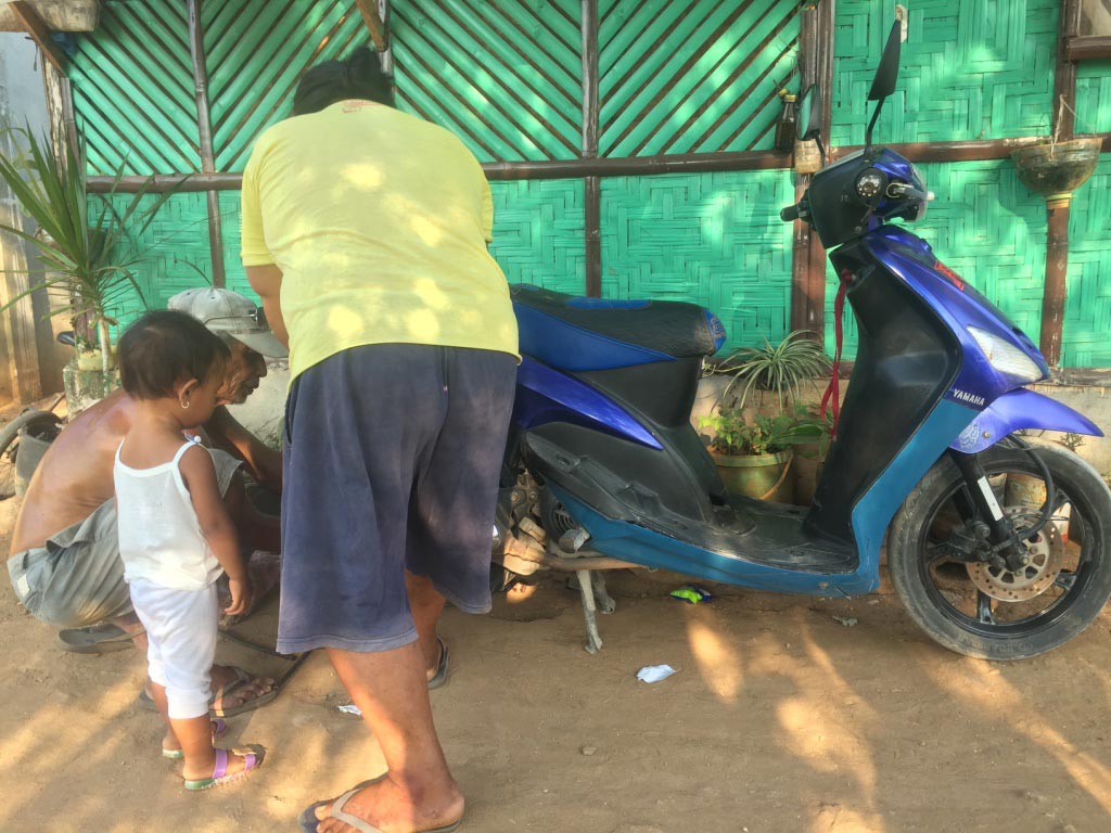 Getting Tire Repaired on a Tropical Island