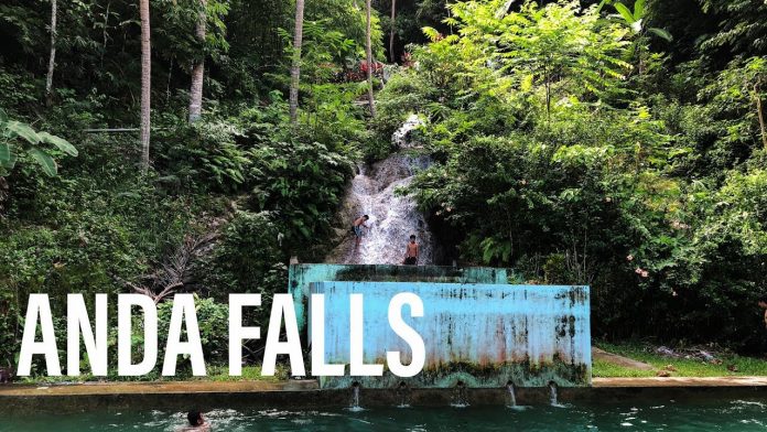Anda Falls, Bohol, Philippines - The Waterfalls Drain into a Swimming Pool Anda Falls, Bohol, Philippines - The Waterfalls Drain into a Swimming Pool